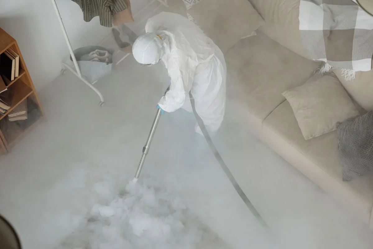 Biohazard cleanup technician in protective equipment, Ephraim, UT